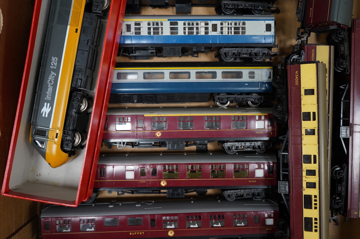 A collection of 00 gauge railway by Hornby, Tri-ang, etc. including; sixteen locomotives (a.f.), many for restoration, together with eighteen bogie coaches including; InterCity, LMS, and BR(MR). Condition - poor to good.